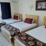 Novena Palms Motel
