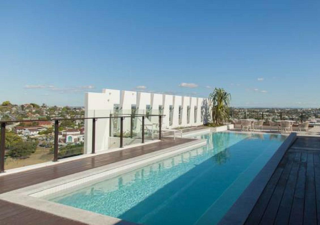 Chic Living In South + Rooftop Pool Apartment